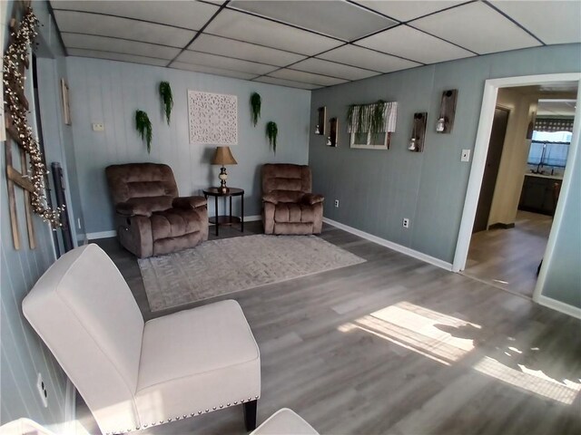 540 Market St, Fairfield Twp, PA 15923 - sitting room featuring wood finished floors, a drop ceiling, and baseboards