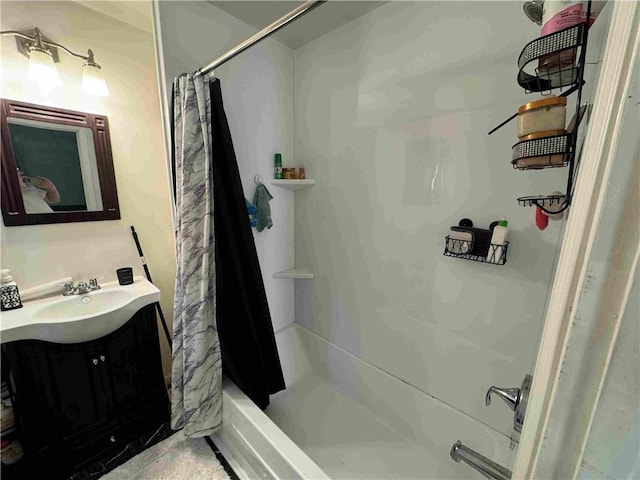 bathroom featuring shower / tub combo with curtain and vanity