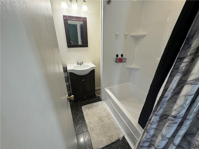 bathroom with tile patterned flooring, vanity, and shower / tub combo with curtain