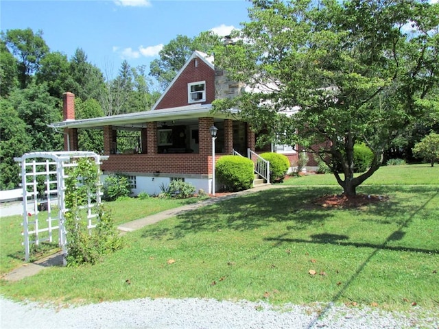 view of front of house featuring a front yard and a porch