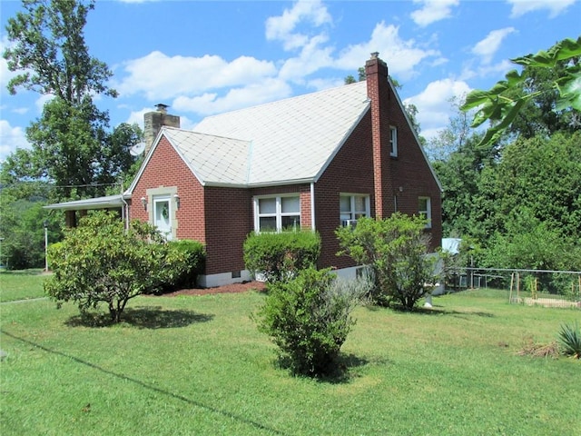 view of property exterior with a lawn