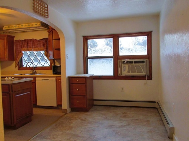 kitchen with cooling unit, a baseboard radiator, dishwasher, and sink