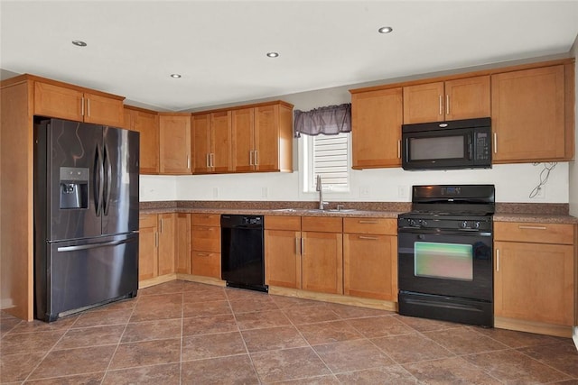 kitchen with sink and black appliances