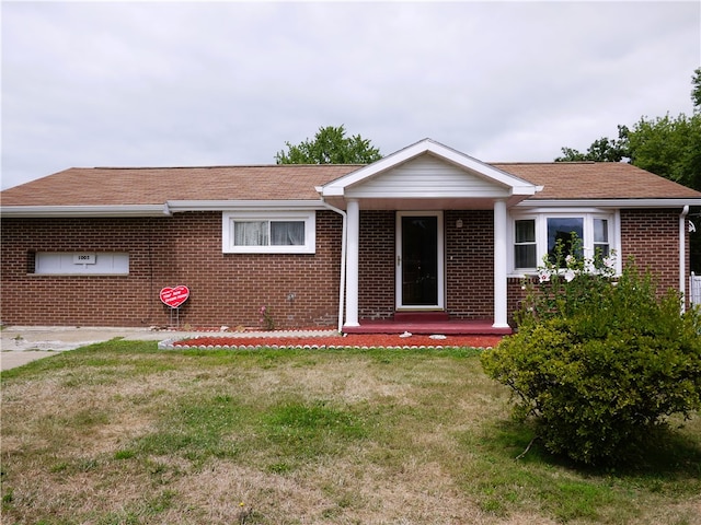 ranch-style house with a front yard