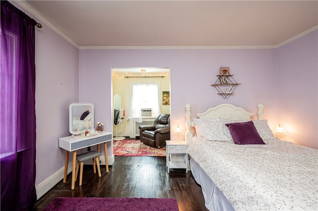 bedroom with dark hardwood / wood-style floors and ornamental molding