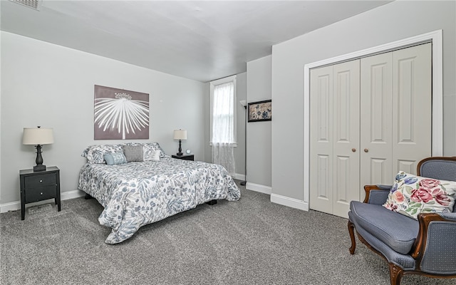 carpeted bedroom featuring a closet