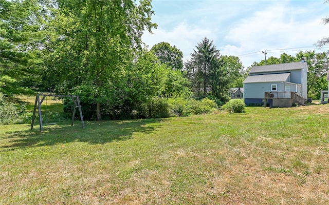 view of yard with a deck