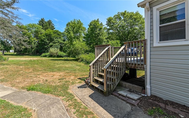 view of yard featuring a wooden deck