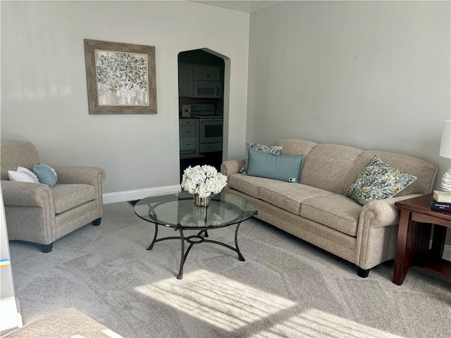 living room with light colored carpet