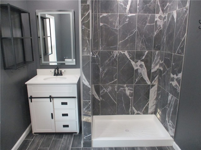 bathroom with vanity and walk in shower