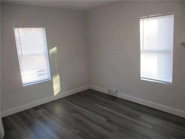 2551 Woodward Ave, Brookline, PA 15226 - unfurnished room with healthy amount of natural light, dark wood-style flooring, and baseboards