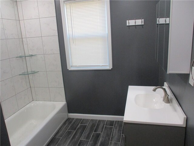 2551 Woodward Ave, Brookline, PA 15226 - full bathroom with baseboards, vanity, and wood finish floors