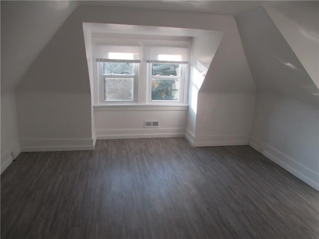 2551 Woodward Ave, Brookline, PA 15226 - bonus room with vaulted ceiling, dark wood-style floors, and baseboards