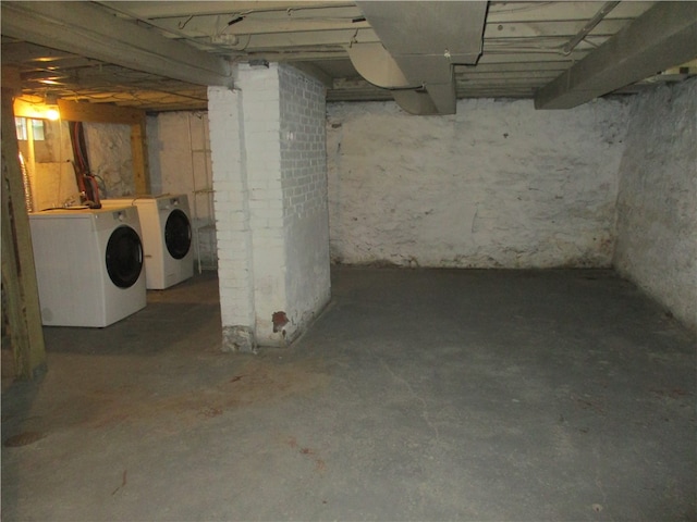 basement with separate washer and dryer