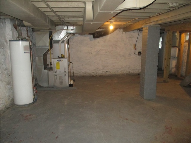 basement with heating unit and water heater