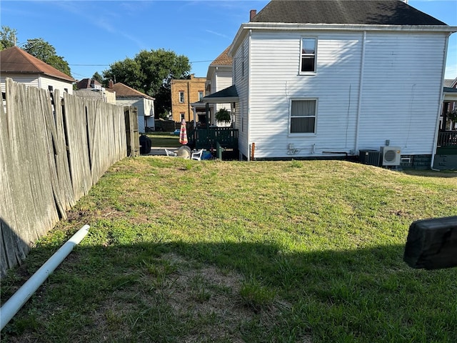 view of yard featuring central AC