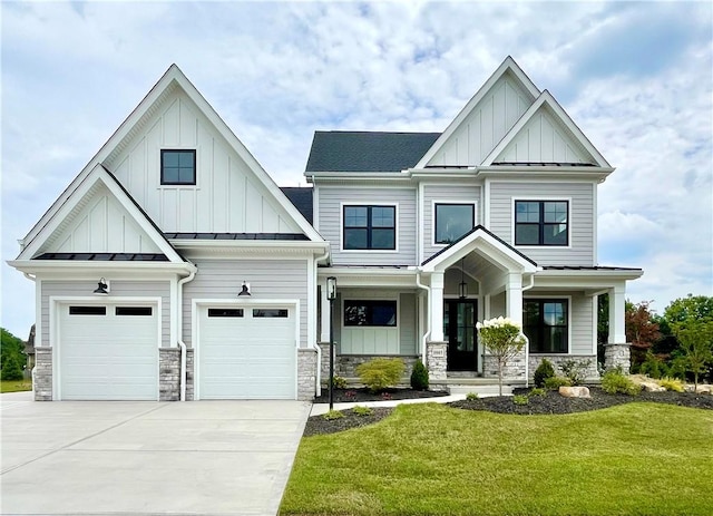 craftsman-style home with covered porch and a front yard