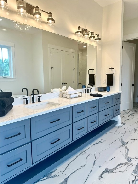 bathroom with an enclosed shower and vanity