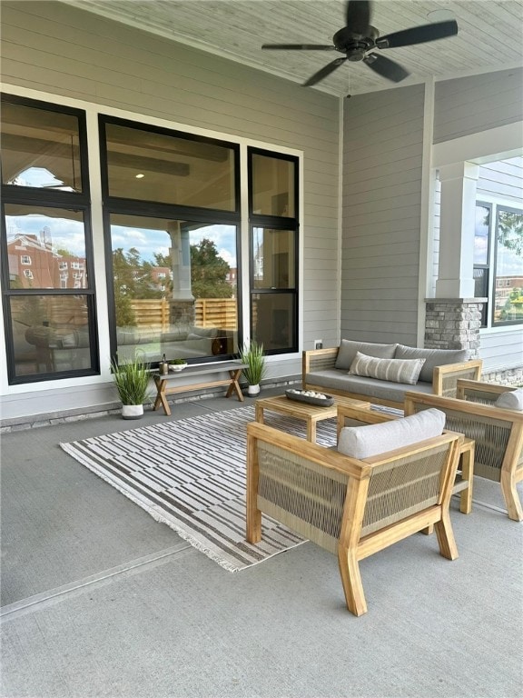 view of patio featuring ceiling fan and an outdoor living space