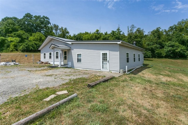 145 Short Ridge Rd, Coal Center Boro, PA 15423 - view of front facade with a front lawn