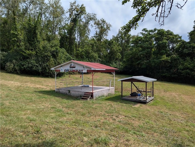 145 Short Ridge Rd, Coal Center Boro, PA 15423 - view of yard with a deck, a carport, and a view of trees