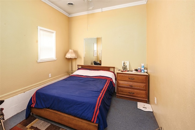 carpeted bedroom featuring ornamental molding