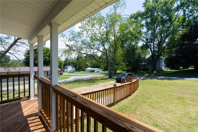 deck featuring a lawn