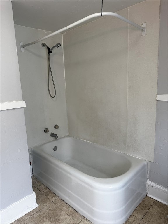 bathroom featuring tile patterned floors and shower / washtub combination