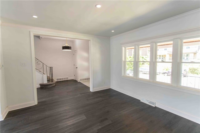 interior space featuring dark wood-type flooring and crown molding