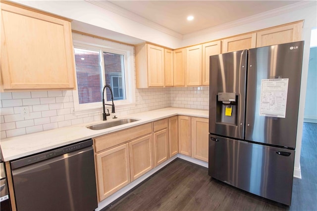 kitchen featuring light brown cabinets, sink, appliances with stainless steel finishes, backsplash, and dark wood-type flooring