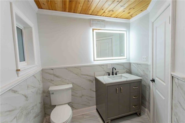 bathroom featuring wood ceiling, tile patterned floors, vanity, and toilet