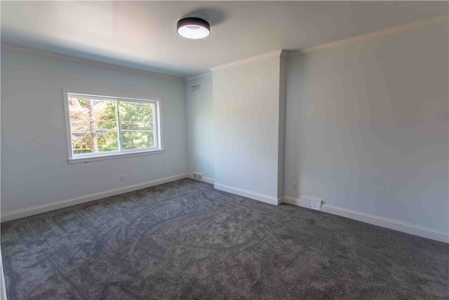 carpeted spare room with ornamental molding