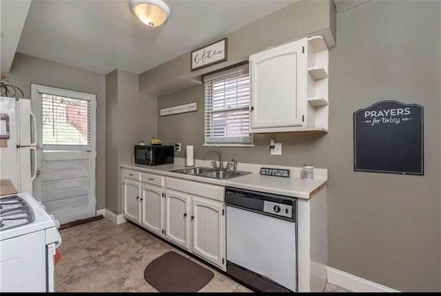 kitchen featuring light countertops, white appliances, white cabinets, and open shelves