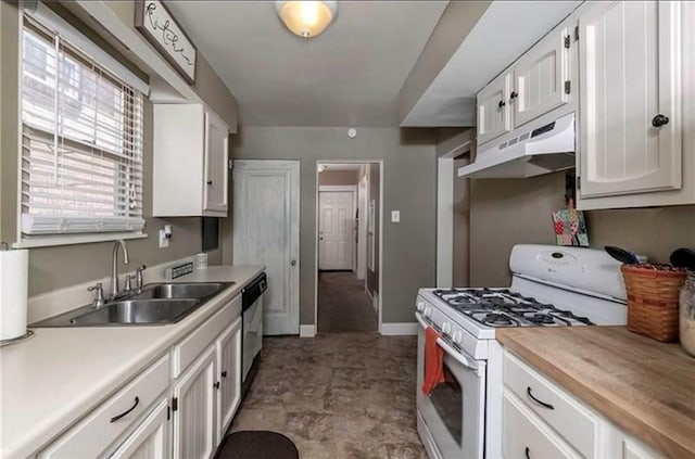 kitchen featuring white gas range, light countertops, under cabinet range hood, white cabinetry, and a sink