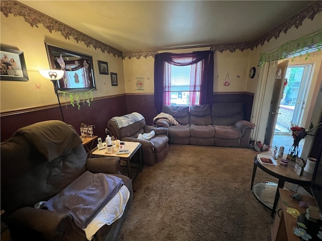 carpeted living room featuring a healthy amount of sunlight