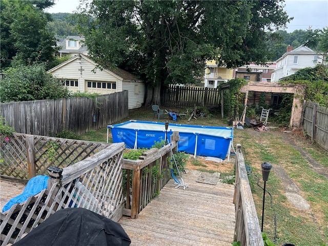 view of swimming pool featuring an outdoor structure