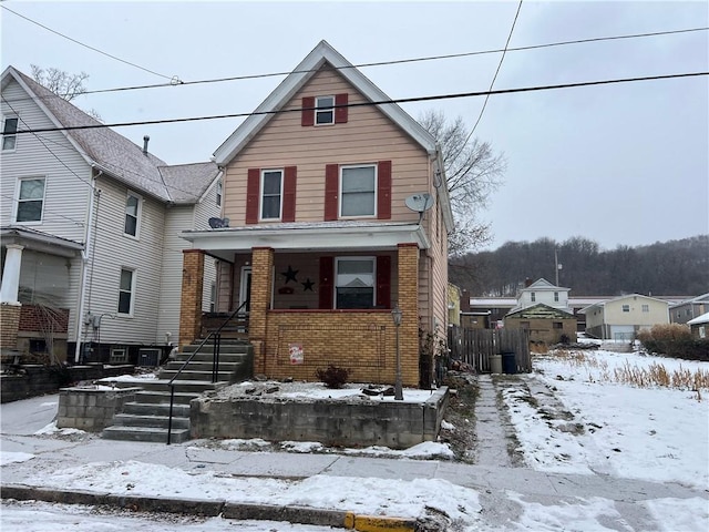 view of front property with covered porch