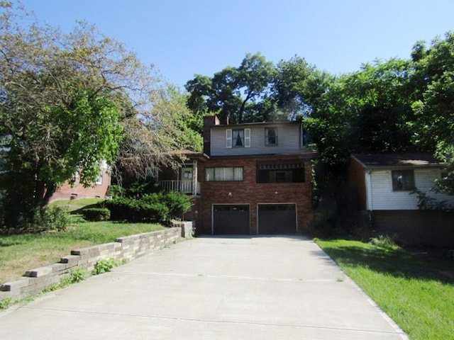 view of front of home with a garage