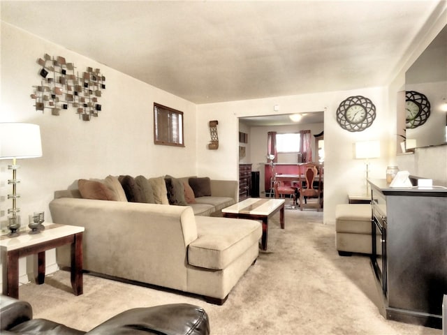 living room featuring light colored carpet