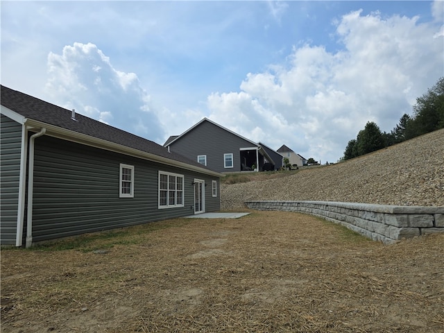 rear view of property with a patio area