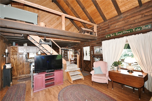 living room featuring wooden ceiling, beam ceiling, and wood-type flooring