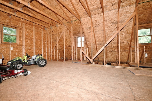 attic featuring a wealth of natural light