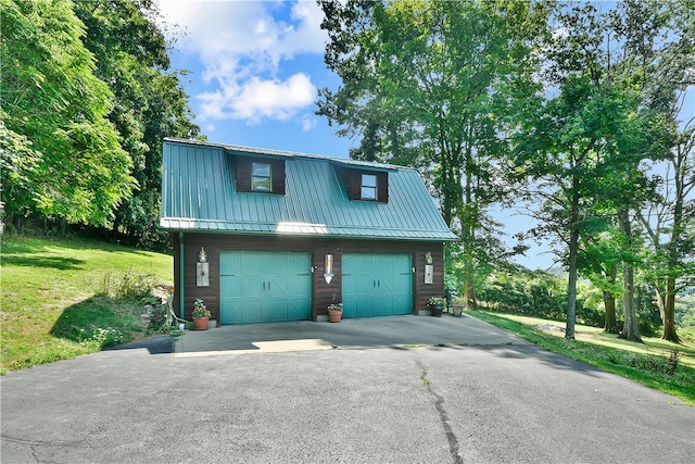 garage featuring a yard