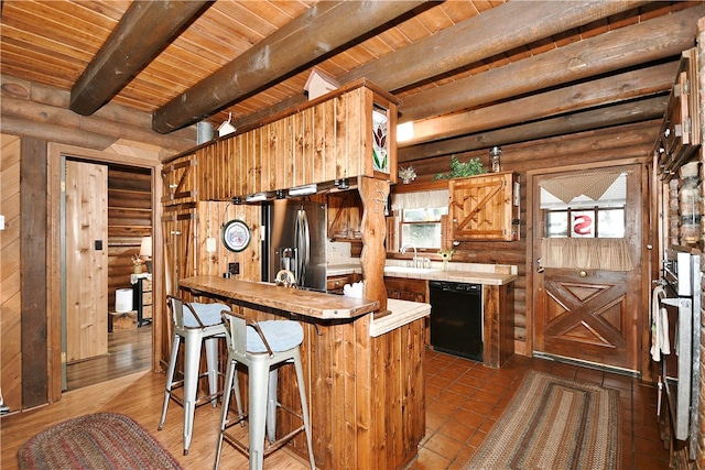 kitchen with log walls, dishwasher, a healthy amount of sunlight, and beam ceiling