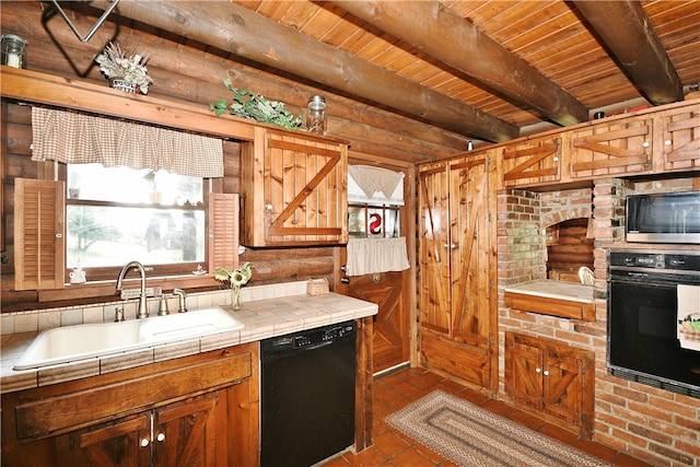 kitchen with beam ceiling, sink, black appliances, tile countertops, and wooden ceiling