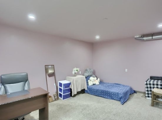 bedroom featuring carpet flooring