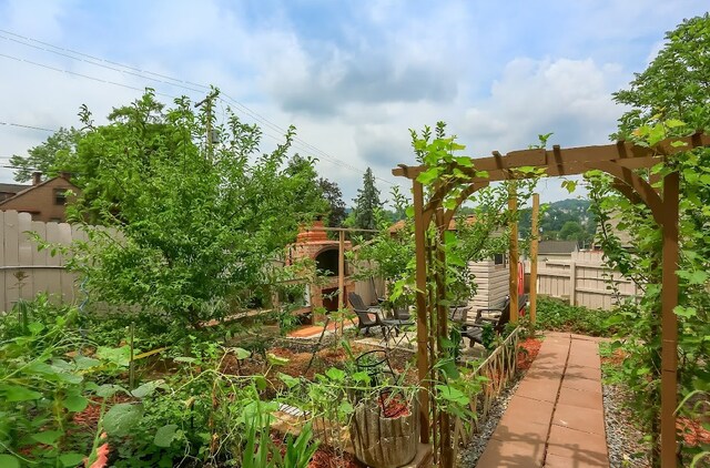 view of yard featuring a fireplace