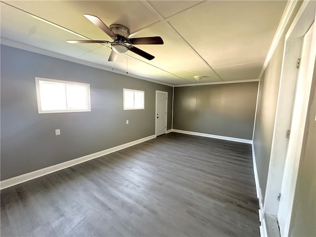 empty room featuring dark hardwood / wood-style floors and ceiling fan