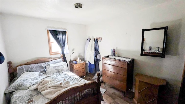 bedroom featuring hardwood / wood-style flooring