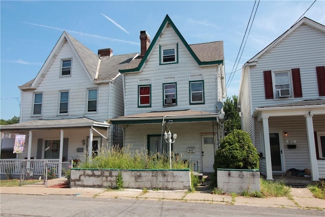 814 Etna St, Mckees Rocks, PA 15136 - view of front facade with covered porch and a chimney